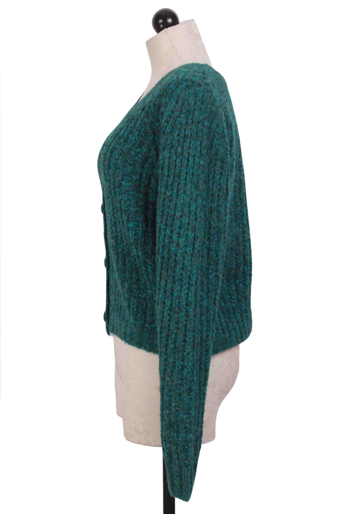 side view of Green V Neck Cable Knit Cardigan by Compania Fantastica