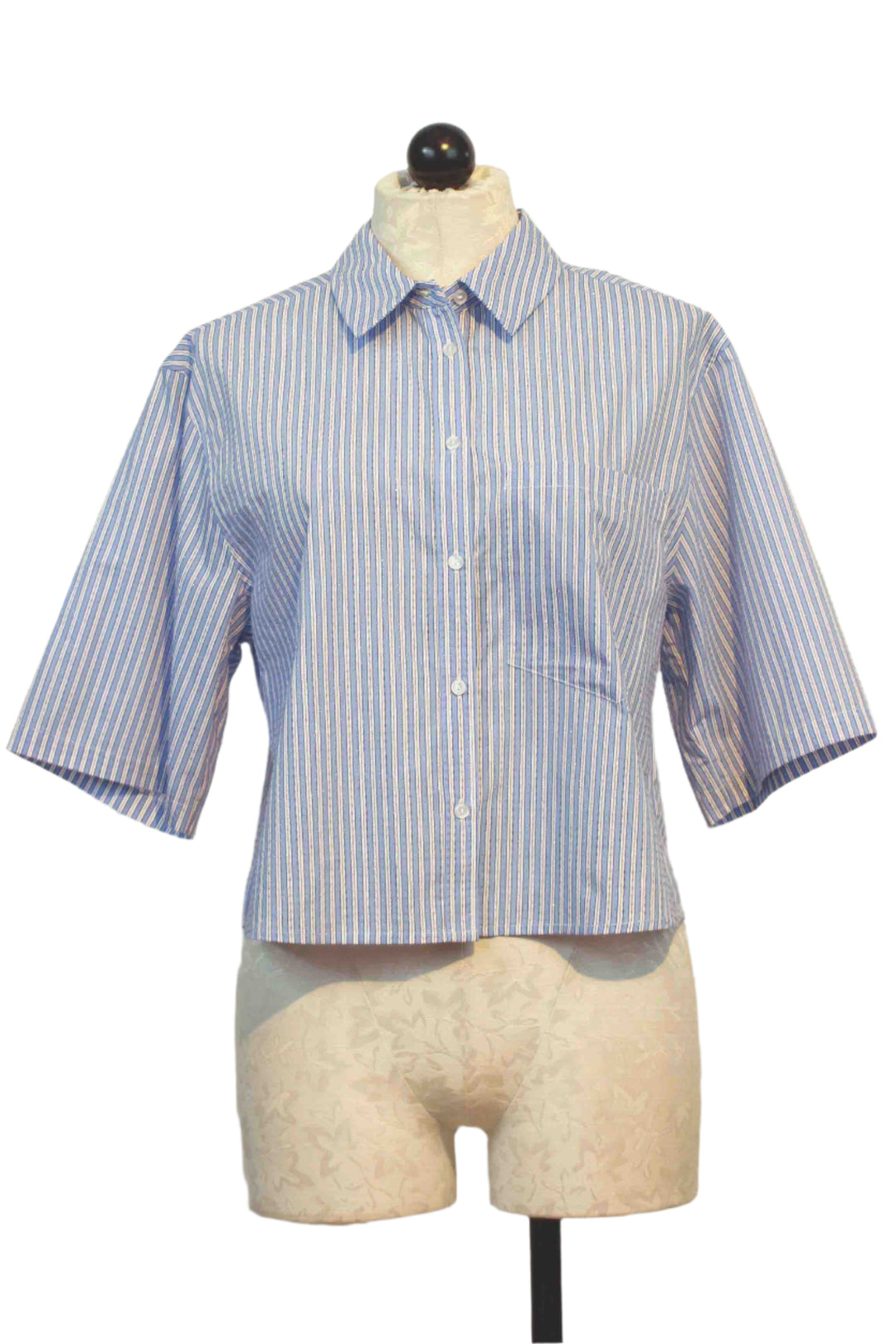 Short Light Blue and White Striped Cirilla Blouse by Berenice with a front patch pocket and tiny transparent rhinestones all over
