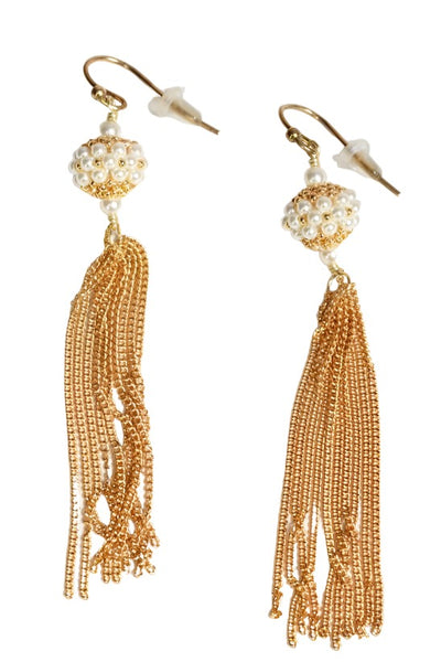 cream pearl gold tassel earrings by Chan Luu.