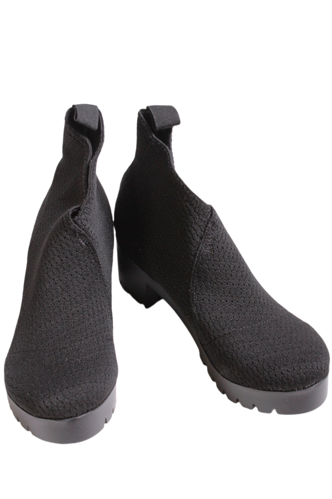 Side view of black Platform bootie by Charleston Shoe Company with a rubber lug bottom sole and elastic upper