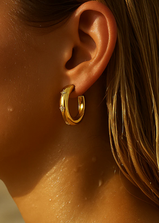 model wearing the Darby Starburst Hoop Earring Gold by Ellie Vail