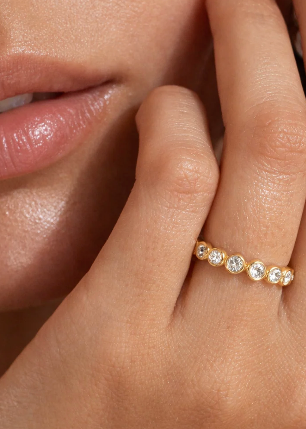 model wearing the Maude Bezel Eternity Ring by Ellie Vail