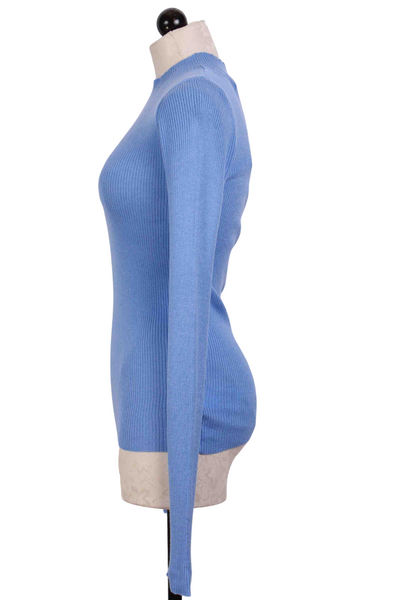 side view of Blue Ribbed Mock Neck Top by Compania Fantastica