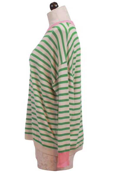 side view of Green and Ivory Oversized Striped Sweater by Compania Fantastic with Pink trim