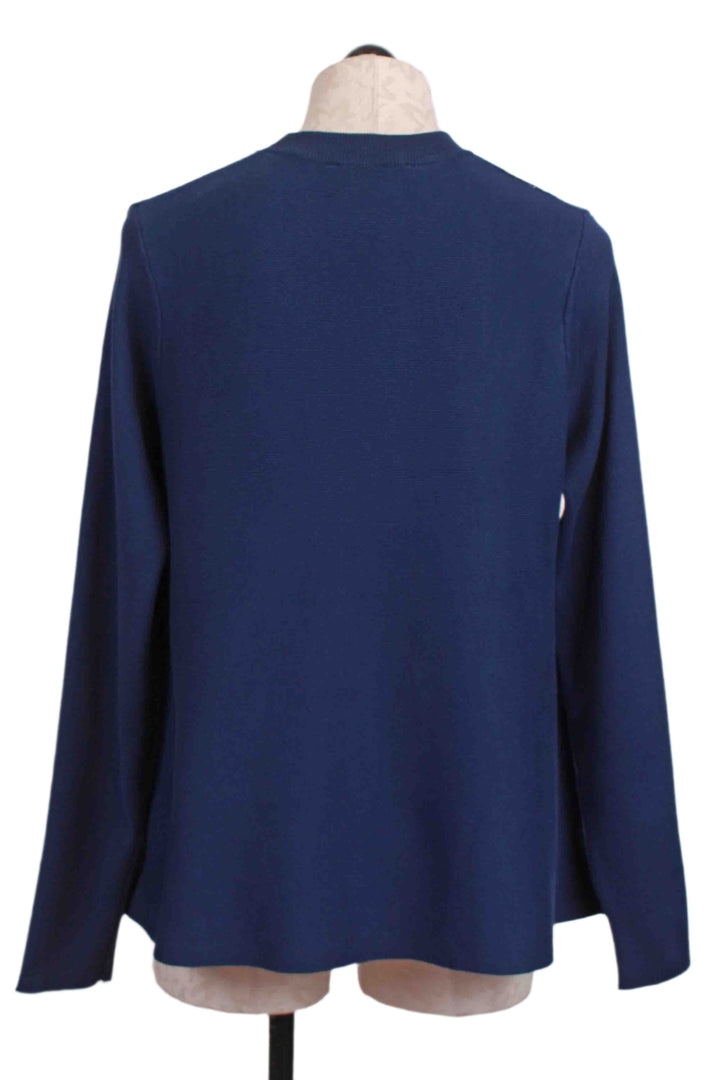 back view of Marino Blue Flared Sweater by Compania Fantastica