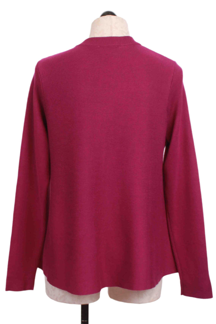 back view of Magenta Cropped Flared Cardigan by Compania Fantastica