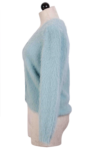 side view of Light Blue Cozy and Fuzzy V Neck Cardigan by Compania Fantastica