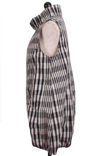 side view of black and white Perfect Sculpt Plaid Tunic Vest from Liv by Habitat