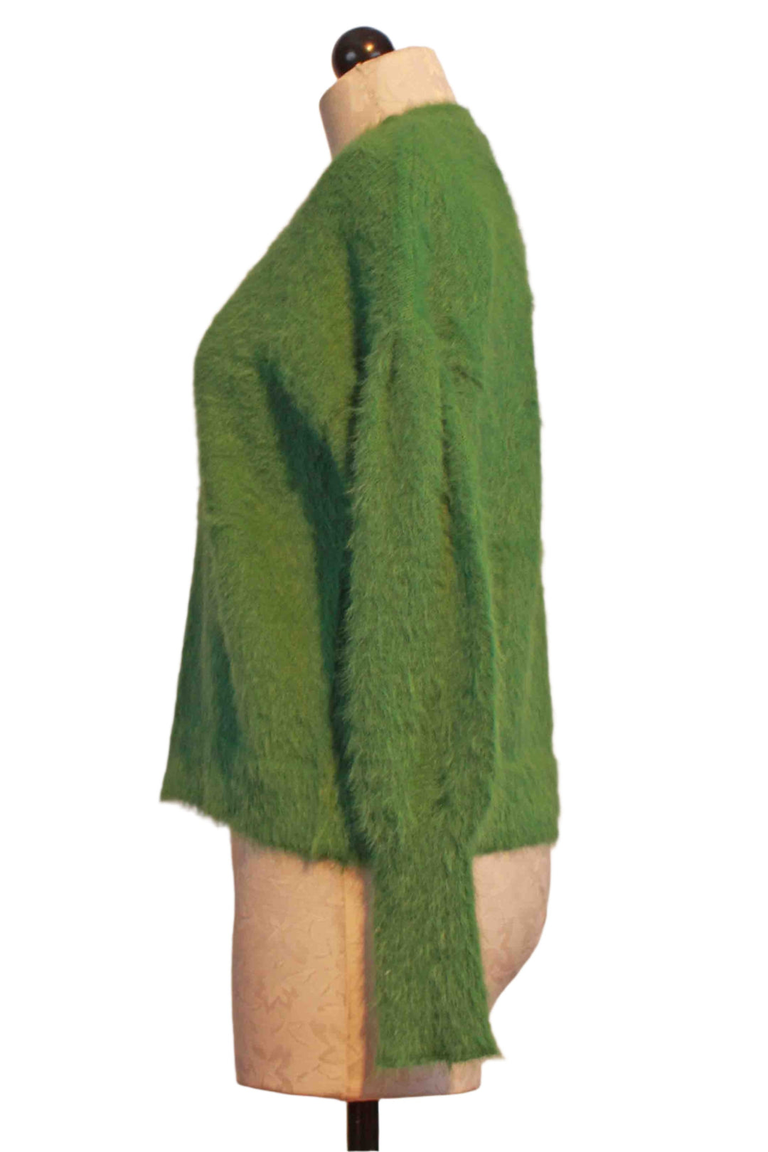 side view of green Fuzzy Blouson Sleeve Sweater by Compania Fantastica