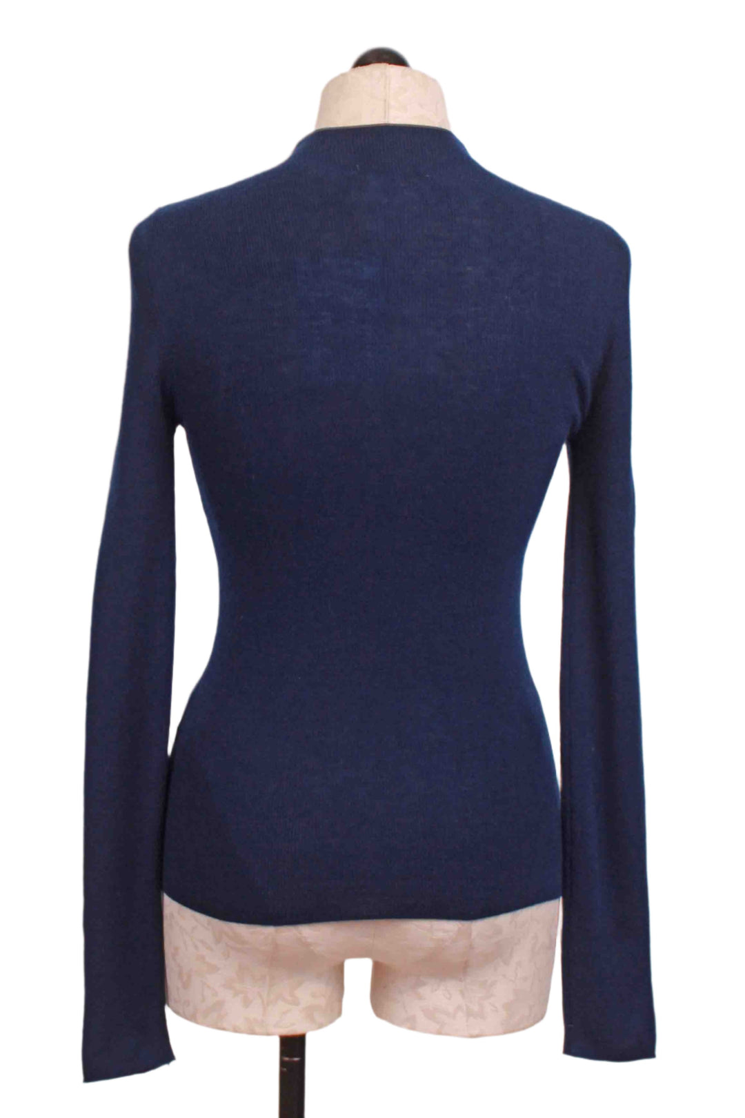 back view of Navy Blue Ribbed Mock Neck Top by Compania Fantastica