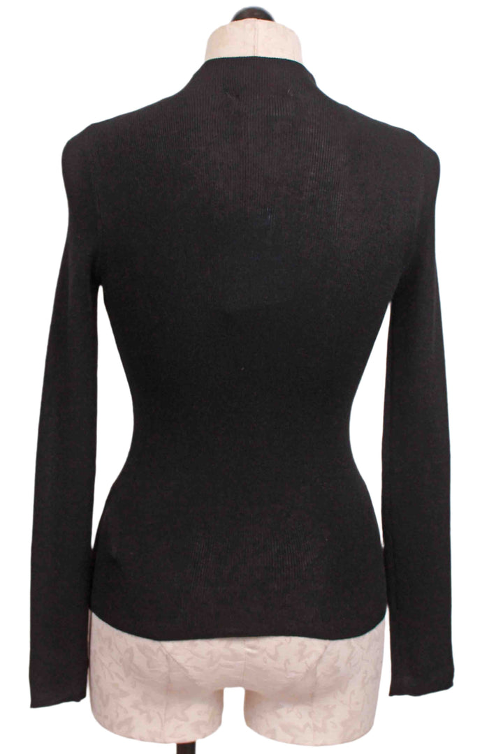 back view of Black Ribbed Mock Neck Top by Compania Fantastica