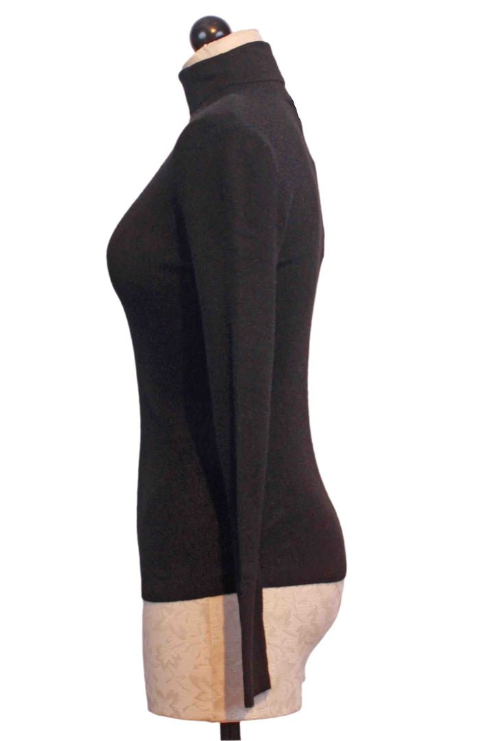 side view of Black Fine Ribbed Turtleneck by Compania Fantastica