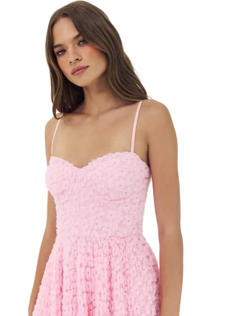 close up of model wearing the Amara Dress by Hutch in the color pink