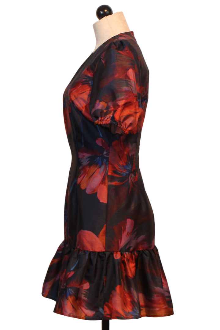 side view of Navy Multi Paper Mache Floral Puff Sleeve Rayan Mini Dress by Hutch