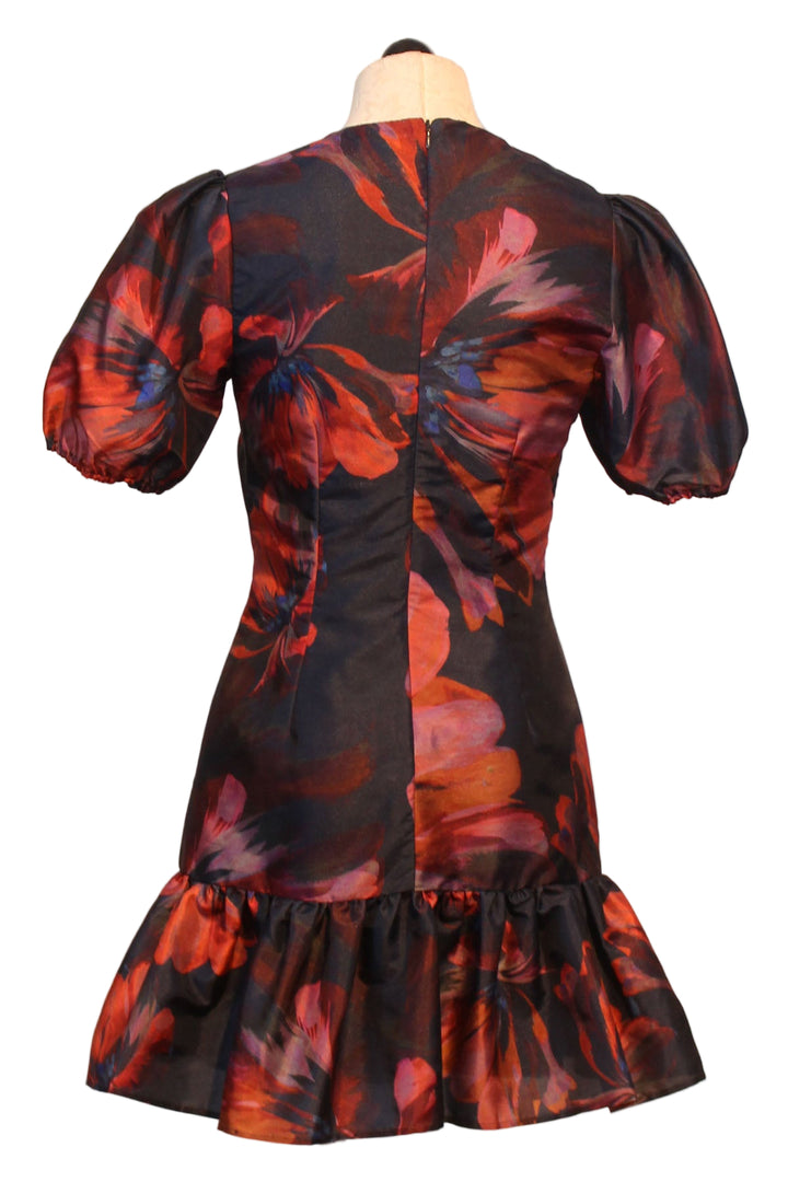 back view of Navy Multi Paper Mache Floral Puff Sleeve Rayan Mini Dress by Hutch