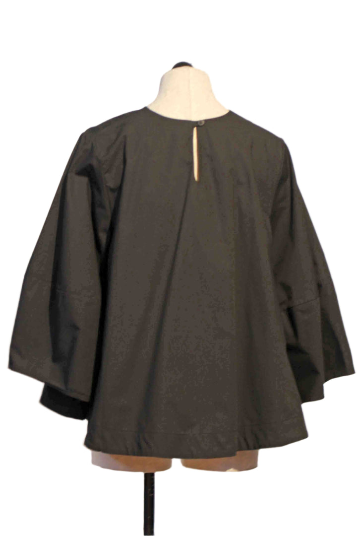 back view of Black Flared Sleeve Cotton Pullover Blouse with Flared Body by Baci 