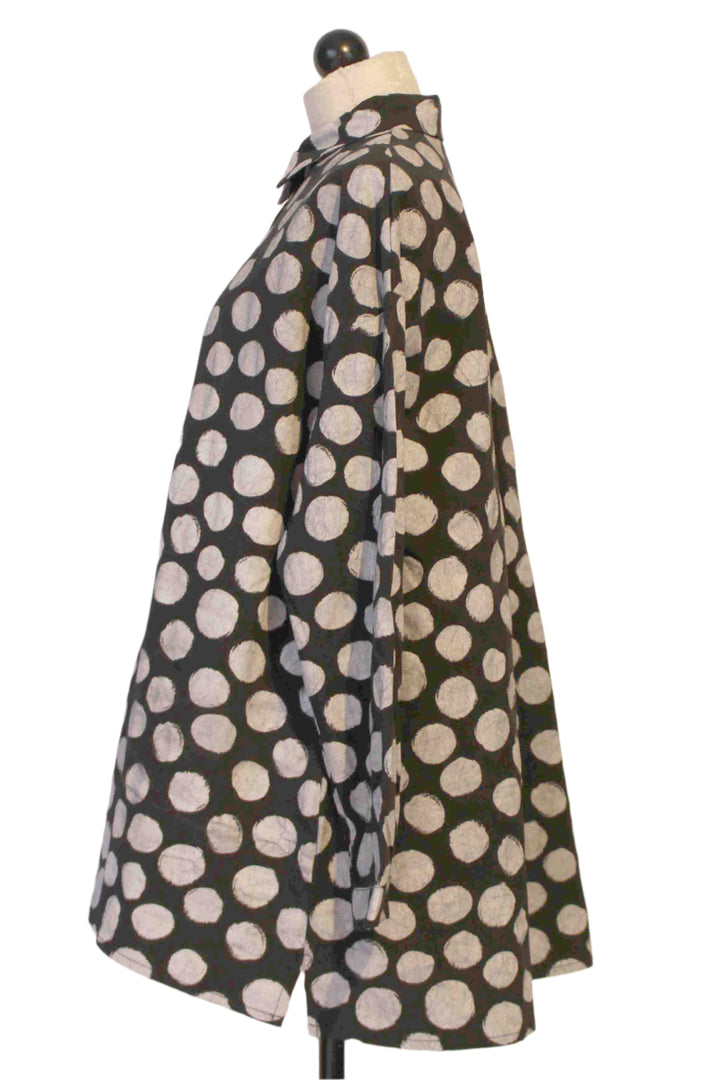 side view of Flared Black and White Polka Dot Soda Print Long Sleeve Shirt by Baci
