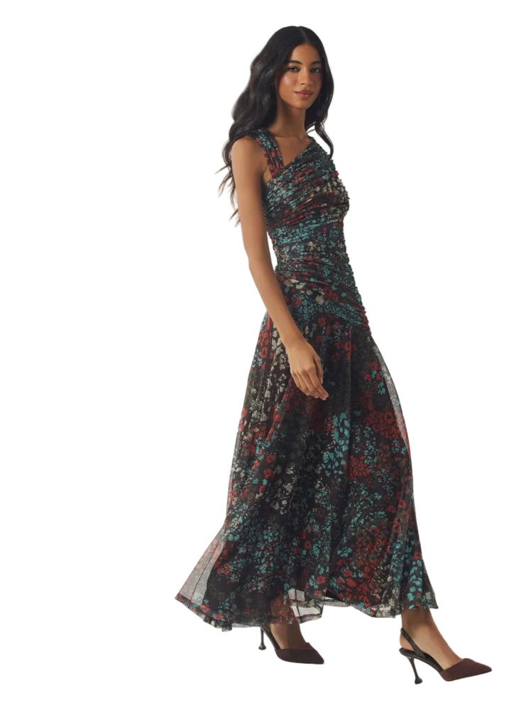 side view of Model wearing the brown multi Ester maxi Dress by Hutch 