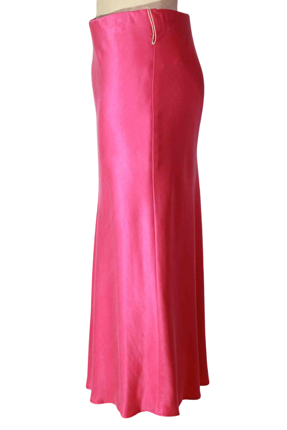 side view of Pink Bias Midi Cut Skirt by Fifteen Twenty