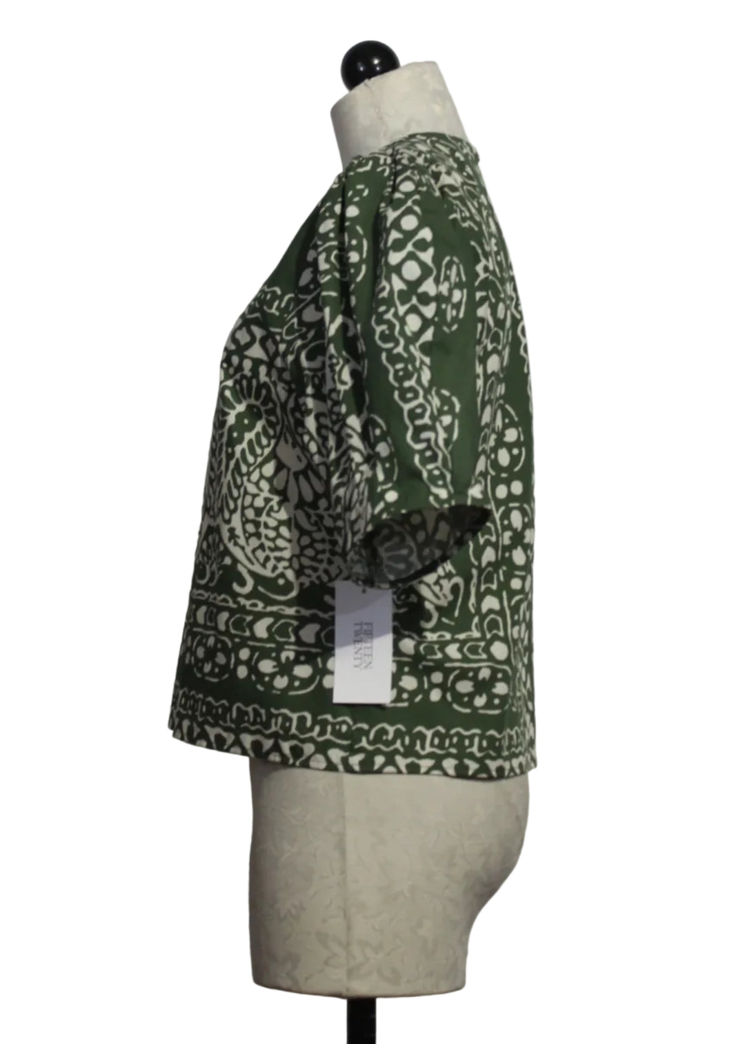 side view of Green and off-White Rosie Puff Sleeve Top by Fifteen Twenty 