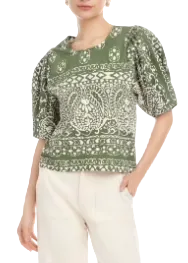 Model wearing Green/Off White Rosie Puff Sleeve Top by Fifteen Twenty with a single button back closure