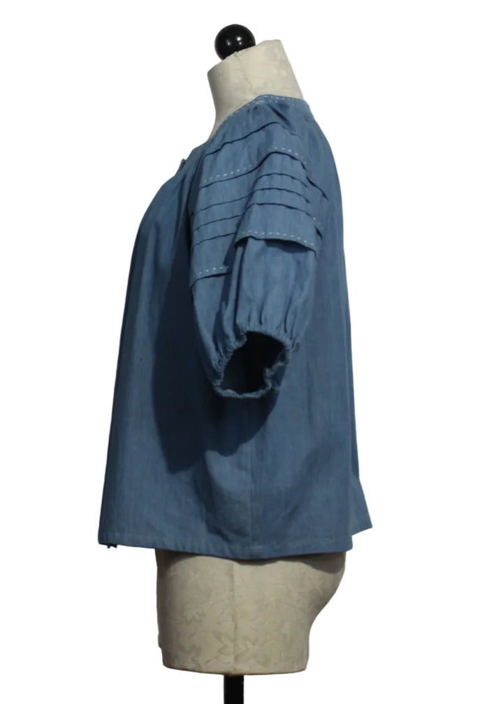 side view of Chambray Shay Contrast Stitch Peasant Top by Fifteen Twenty