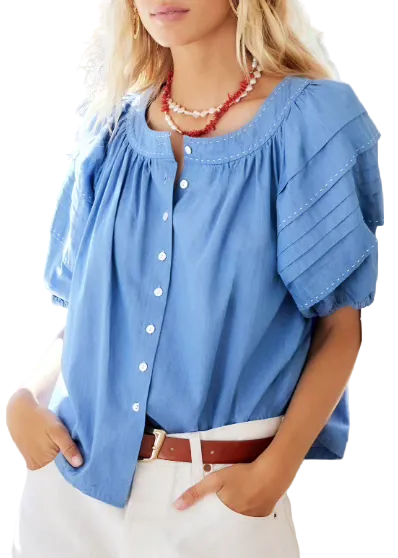 model wearing the Chambray colored Shay Contrast Stitch Peasant Top by Fifteen Twenty with short pleated elastic bottom sleeves