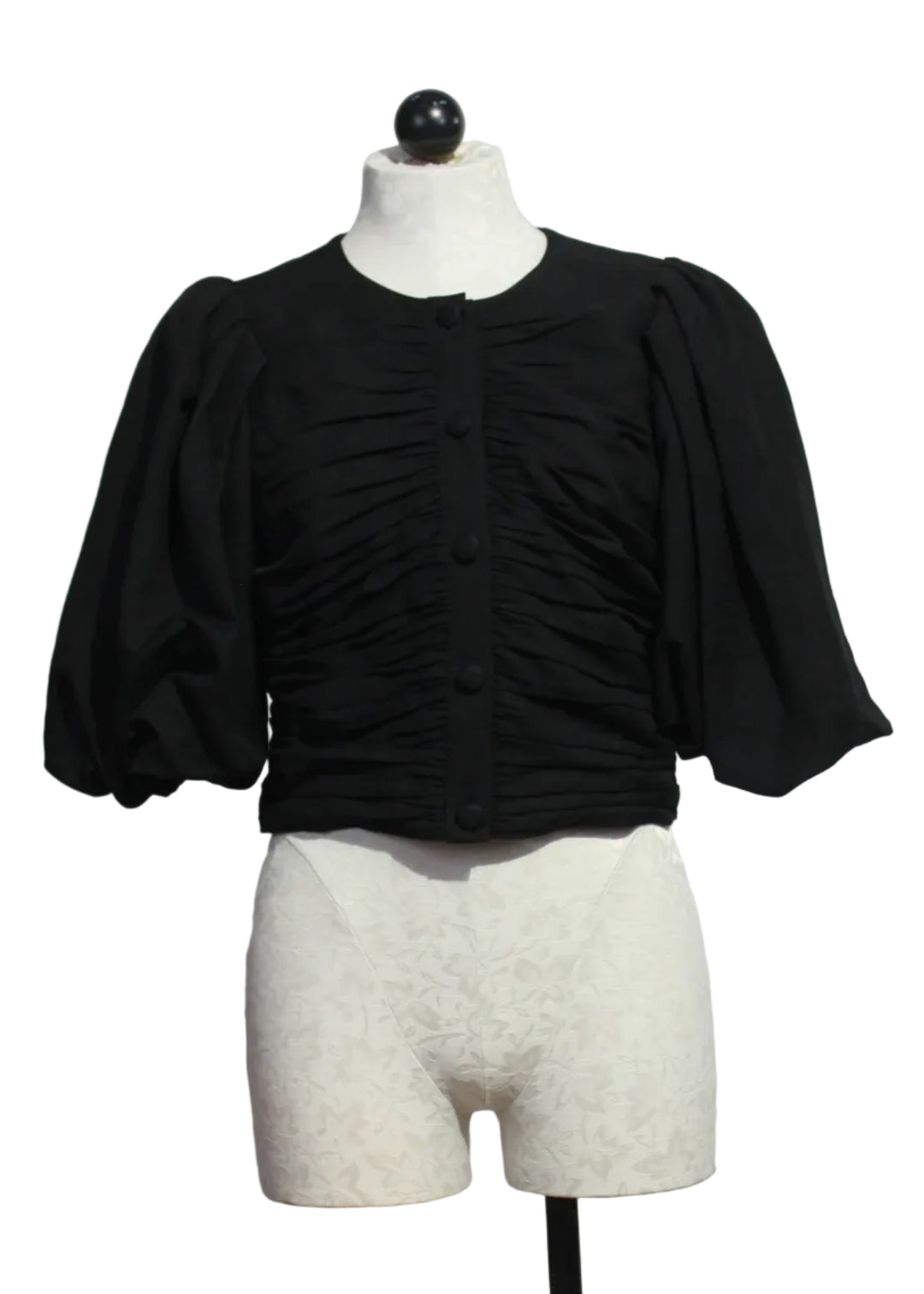 The black cropped Rowan Top by Marie Oliver with short blouson sleeves and ruched detailing on the front and back.Rowan Top by Marie Oliver 
