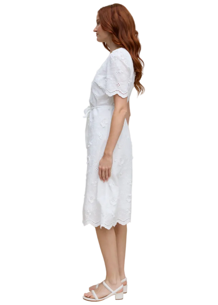 side view of Model wearing The Ivory Meadow Dress by Margaret O'Leary