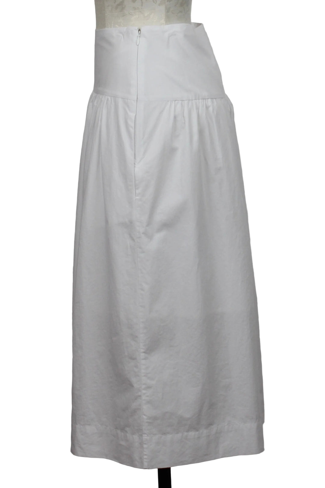side view of The Venice Poplin Skirt by Margaret O'Leary in a Bright White