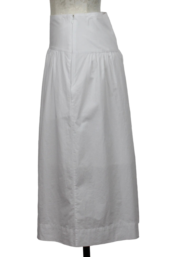 side view of The Venice Poplin Skirt by Margaret O'Leary in a Bright White