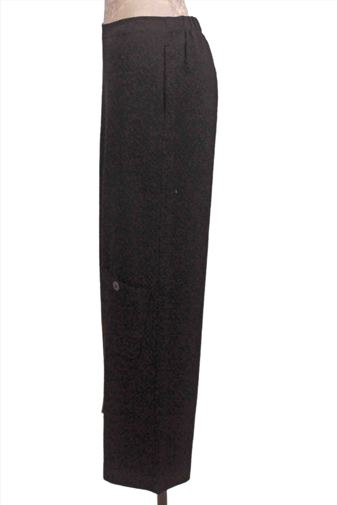 side view of black Crinkle Crepe Solid Flat Front Ankle Pant by Habitat