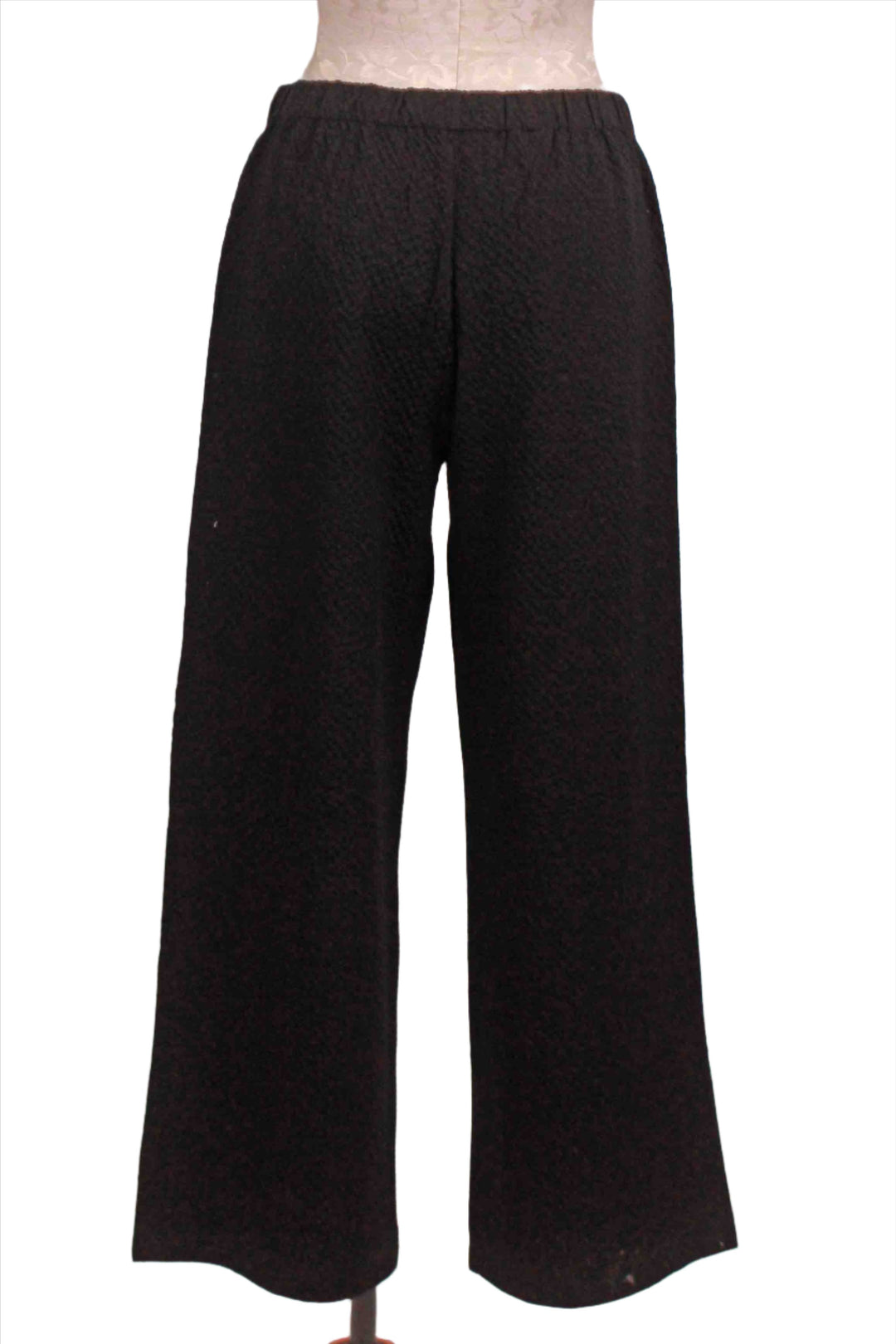 back view of black Crinkle Crepe Solid Flat Front Ankle Pant by Habitat