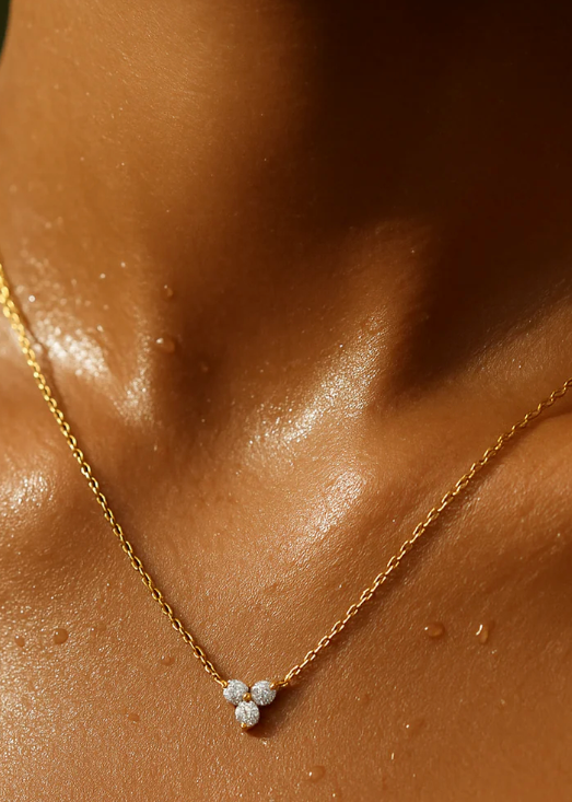 model wearing the Donna Triple Stone Necklace by Ellie Vail