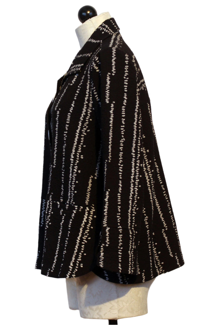 side view of Crinkle Crepe Bud Tulip Hem Swing Jacket by Habitat