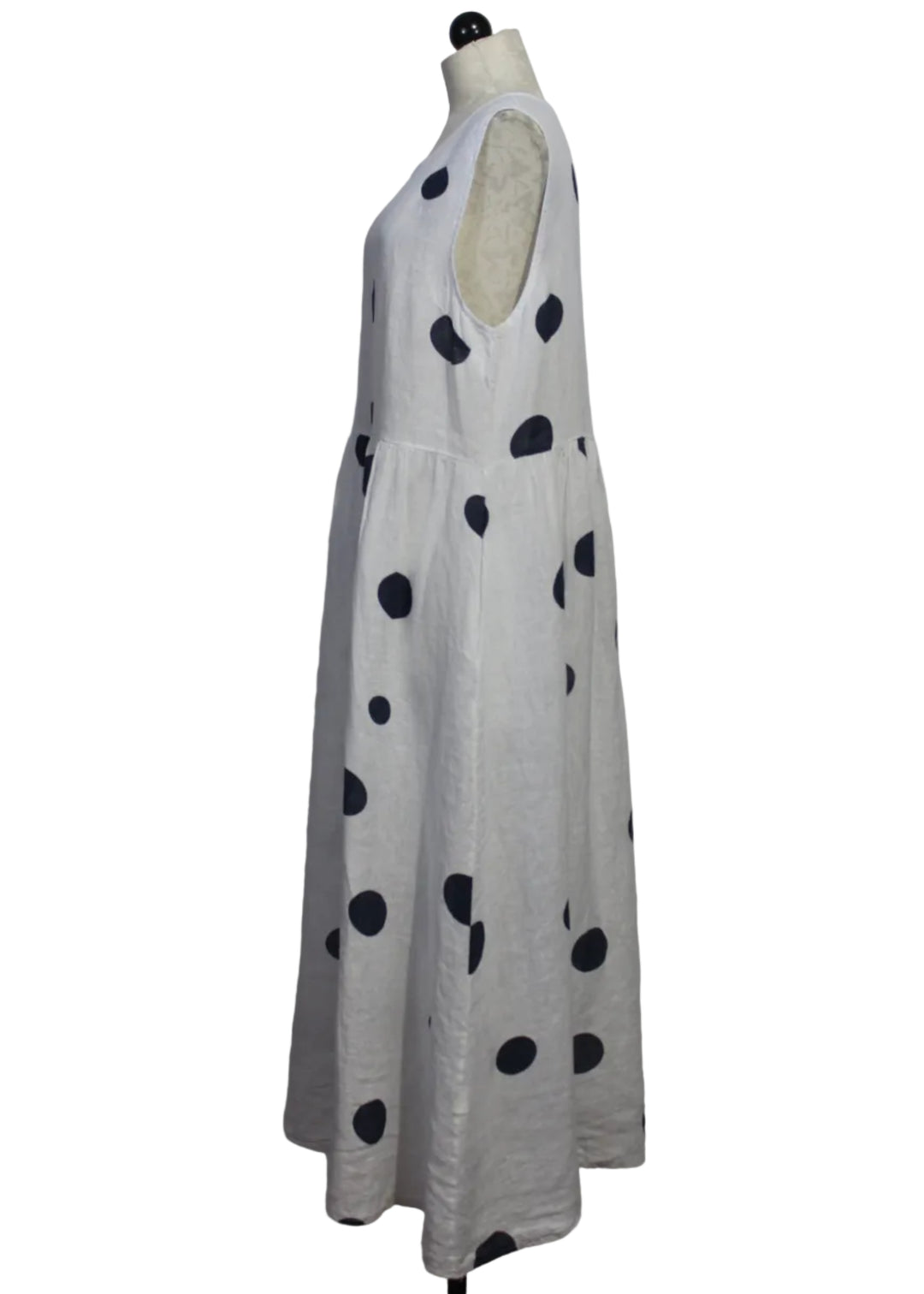 side view of White Linen Sleeveless Dress With Navy Polka Dots by Bella Amore