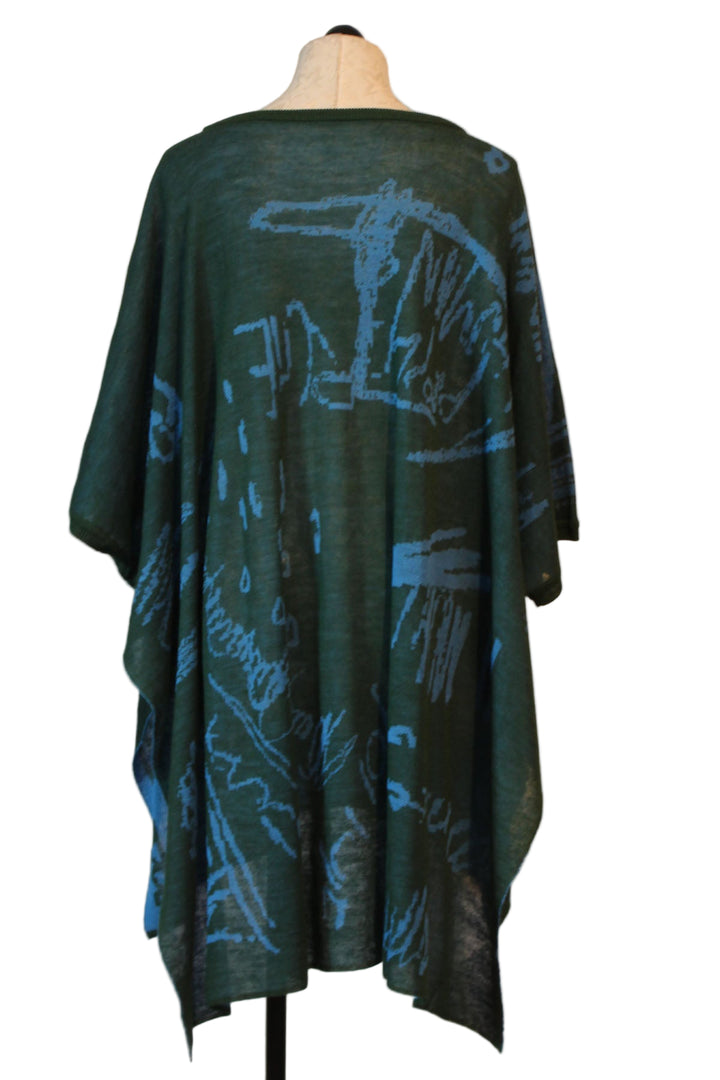 back view of Green/Aqua Soft Square Oversized Hi-Lo Wool Blend Tunic by Moyuru with a Abstract Print with Armholes