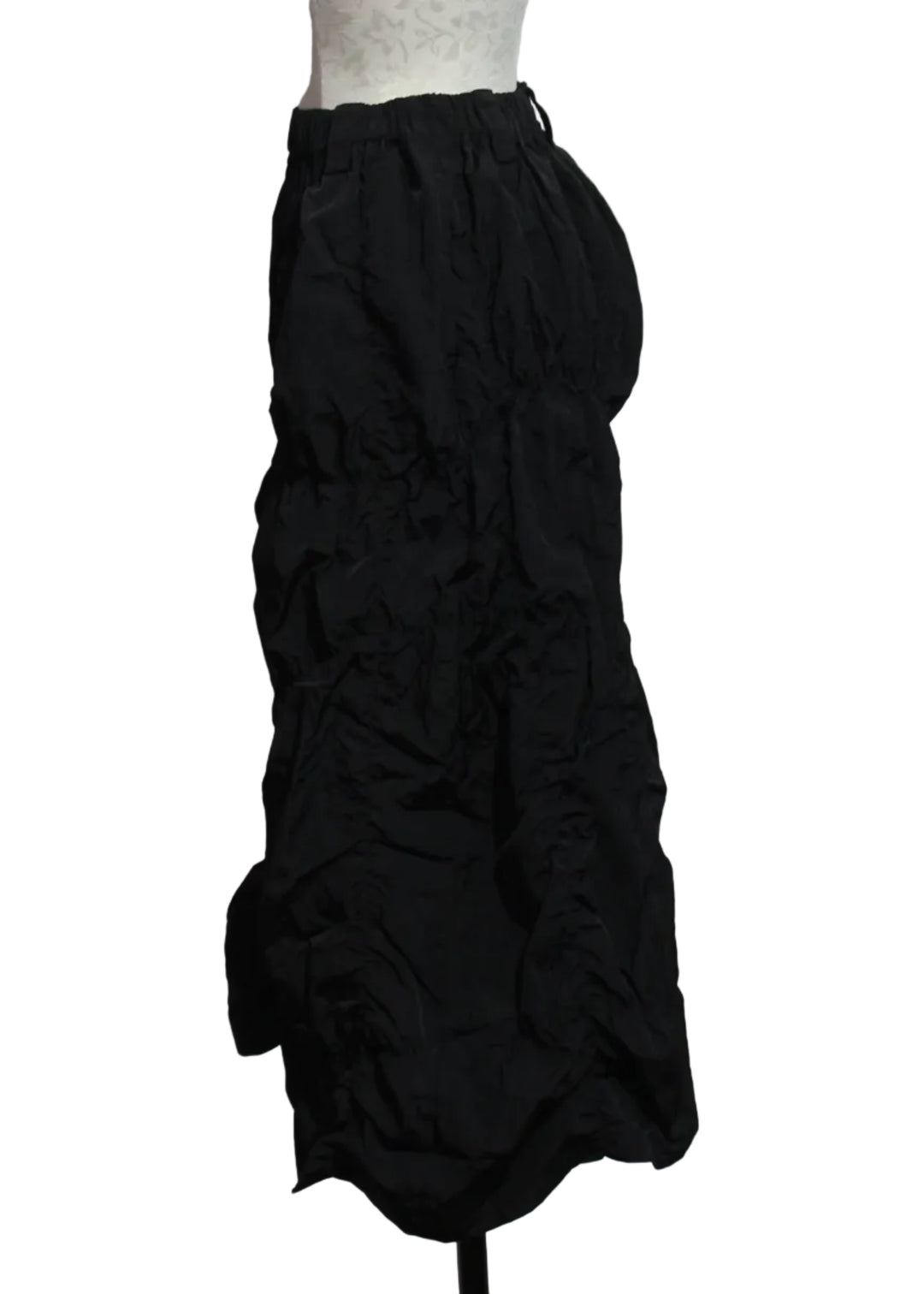 side view of Black Puckered Pull-On Skirt by Moyuru