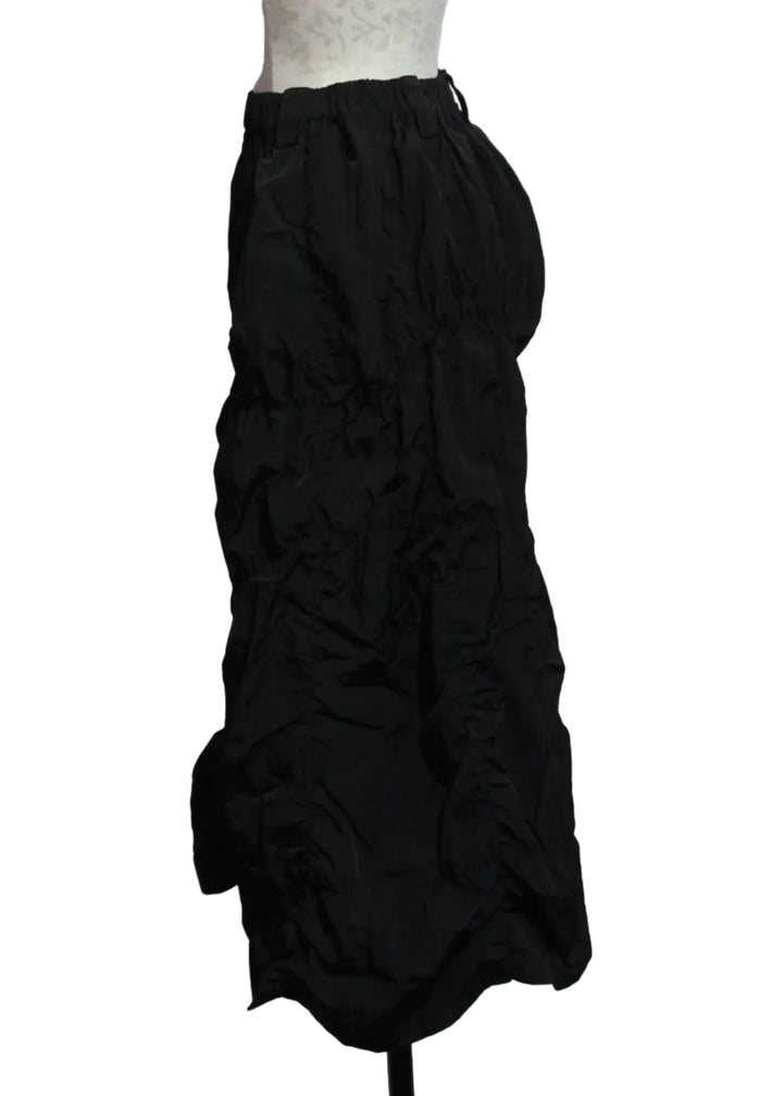 side view of Black Puckered Pull-On Skirt by Moyuru
