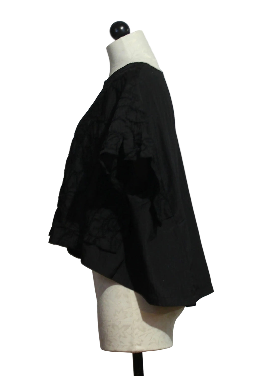 side view of Black Embroidered Cap Sleeve Cropped Top by Moyuru 