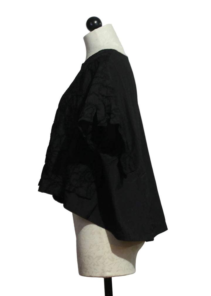 side view of Black Embroidered Cap Sleeve Cropped Top by Moyuru 