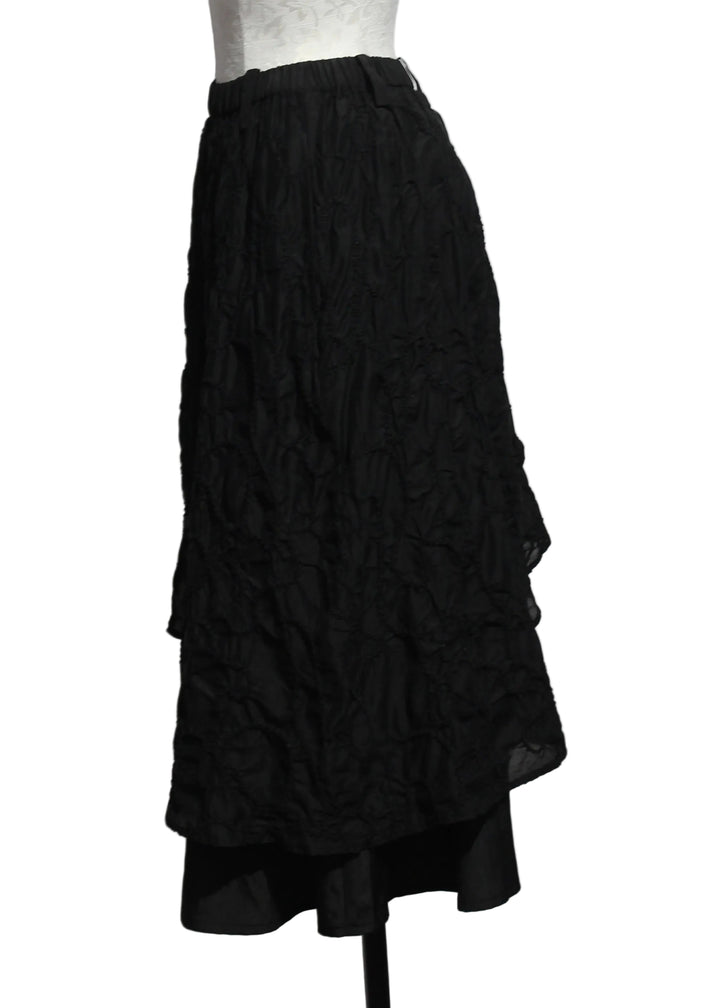side view of Black Embroidered Overlay Skirt by Moyuru