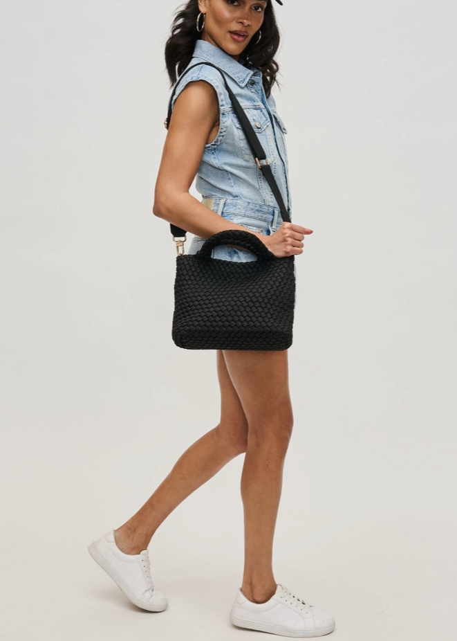 model wearing the Black Sky's the Limit Small Laced Up Eco Edition Crossbody by Sol and Selene