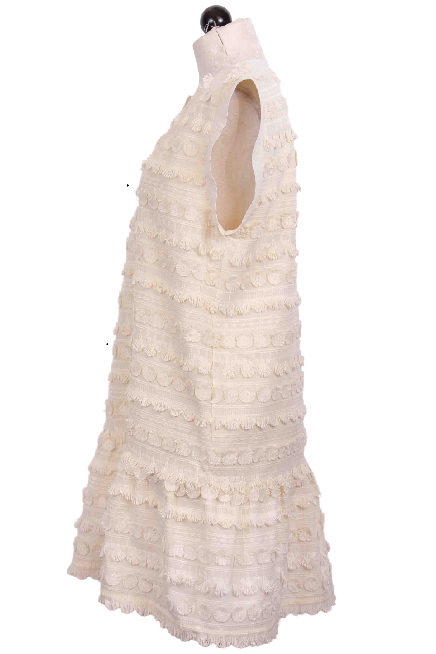side view of Blanc colored Herra fringe Dress by Marie Oliver