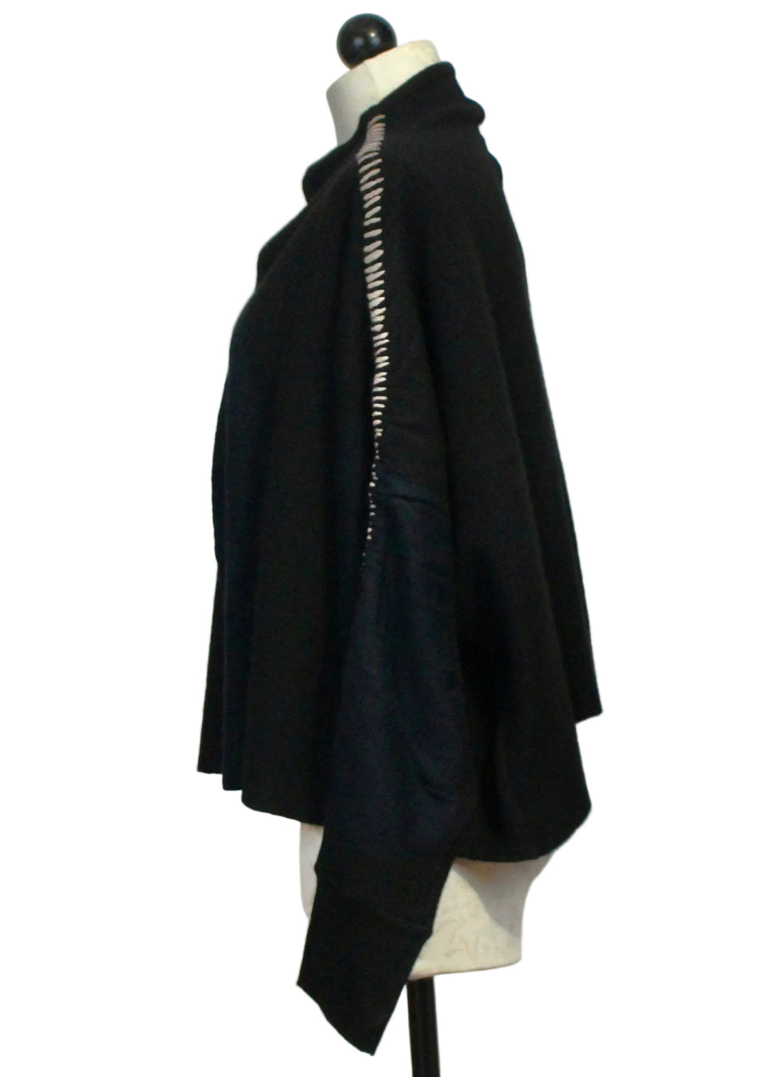 Side view of The Black Whipstitch Cardigan with Navy Circles by Moyuru 