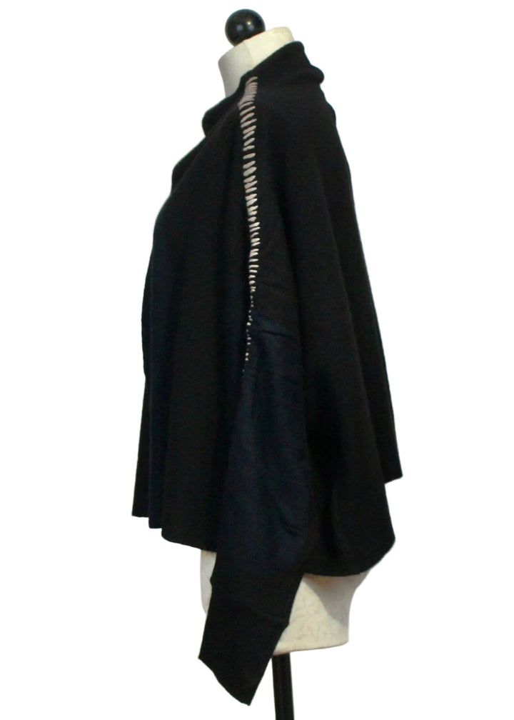 Side view of The Black Whipstitch Cardigan with Navy Circles by Moyuru 
