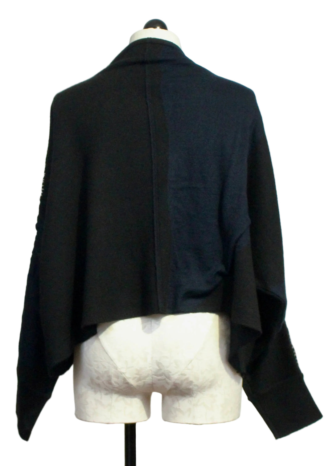 back view of The Black Whipstitch Cardigan with Navy Circles by Moyuru 