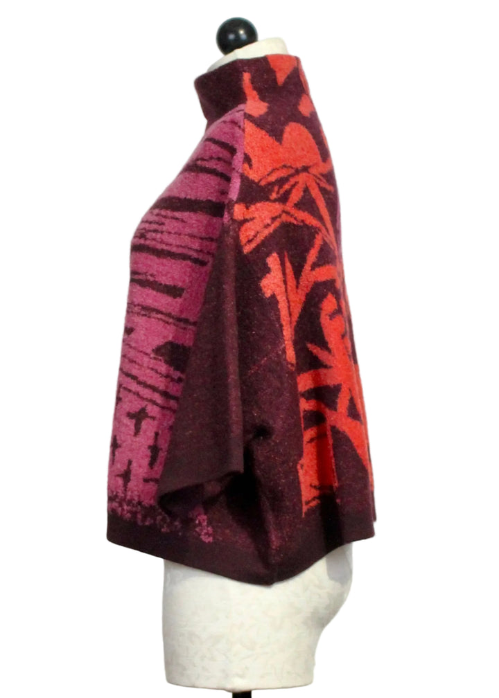 Side view of The Cropped Pullover Sweater by Moyuru in Purple/Pink/Orange