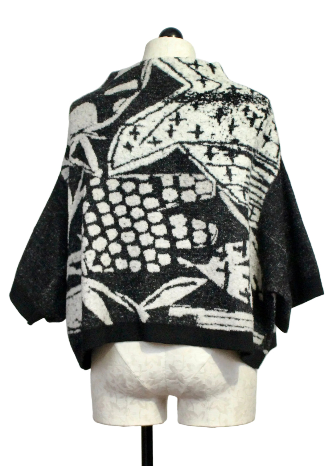 Back view of The Cropped Pullover Sweater by Moyuru in Black and Ivory