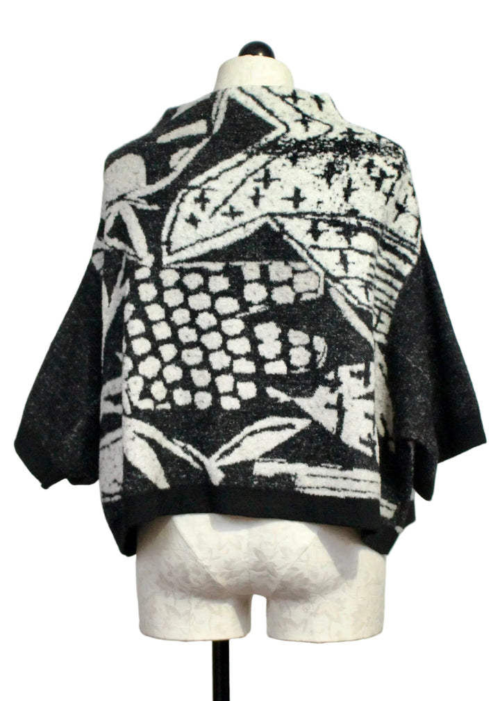 Back view of The Cropped Pullover Sweater by Moyuru in Black and Ivory